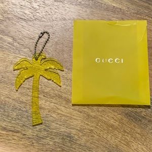 2 GUCCI acrylic palm tree charms
